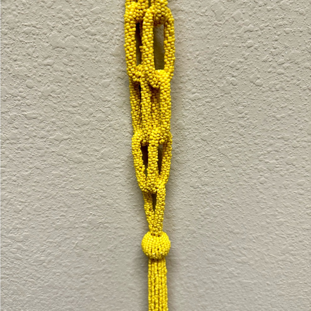 Beets yellow necklace.